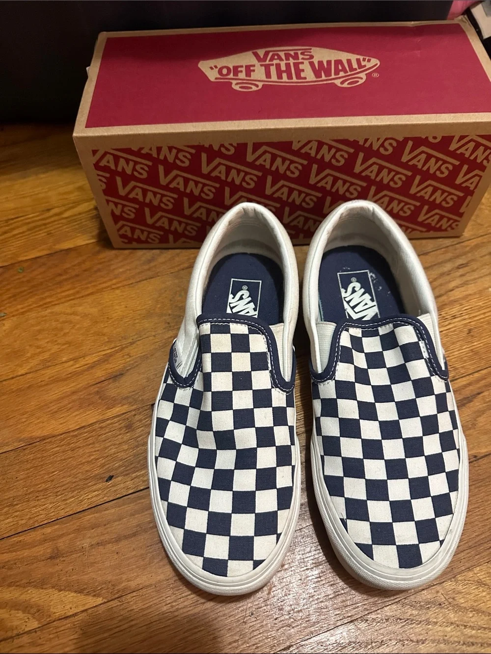 Vans Checkerboard Slip-On Sneakers in Navy & White